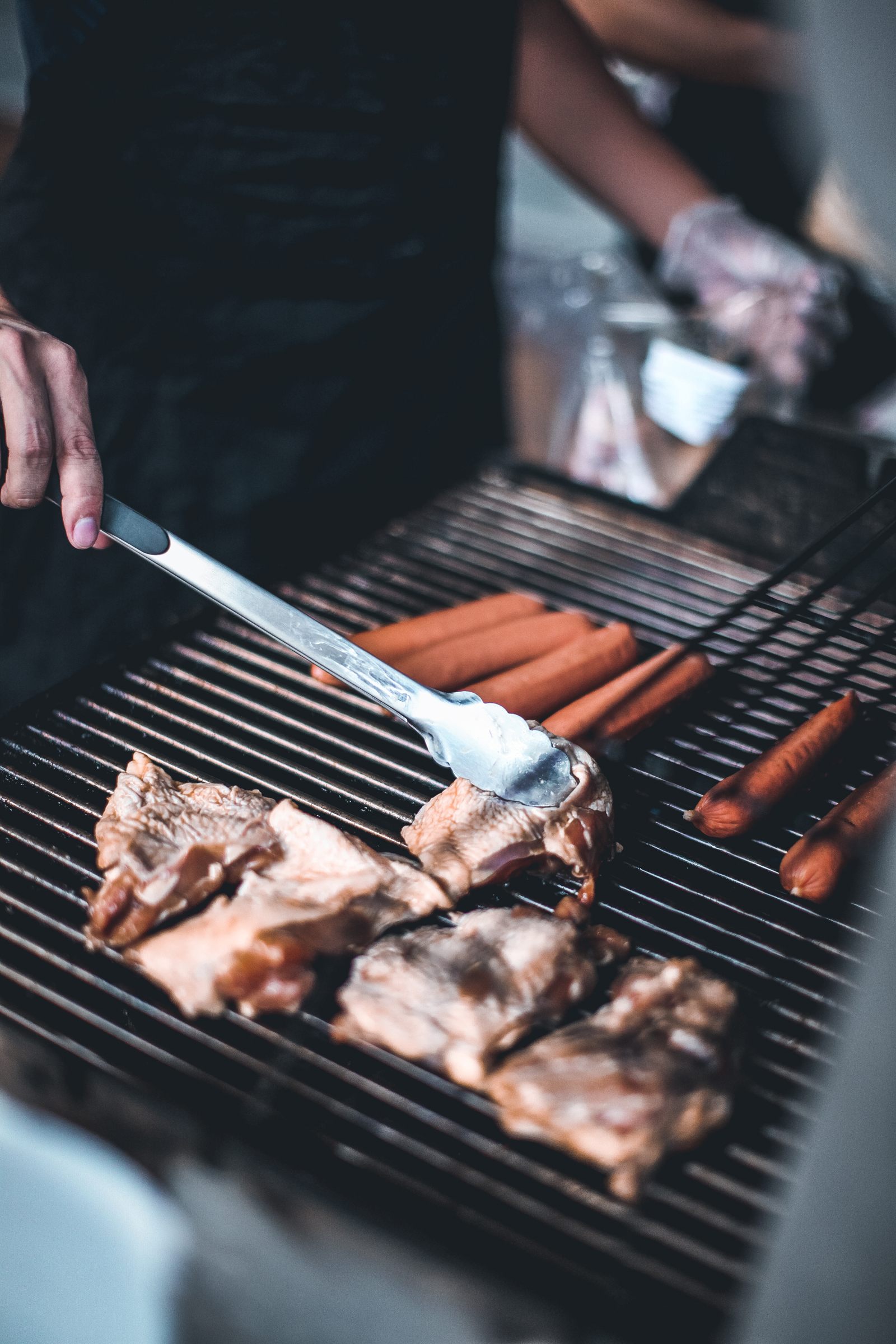 Ribs being grilled and basted by the Sunday Roast chef during an omakase BBQ