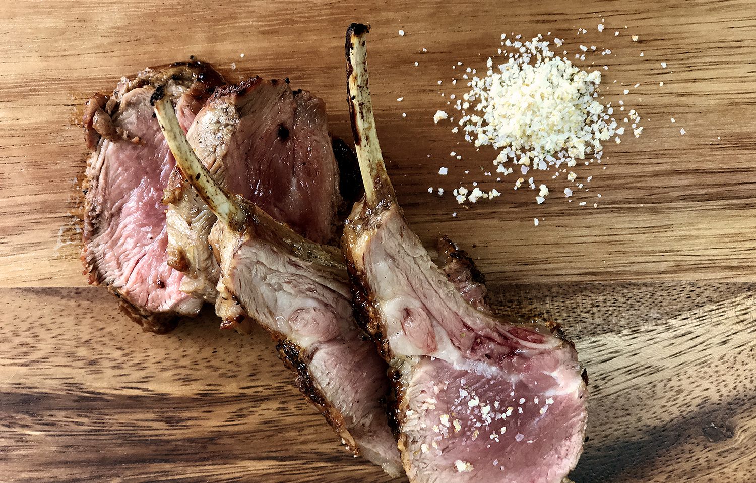 NZ spring lamb cutlets prepared medium-rare for the Insider omakase BBQ tier