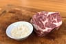 Ribeye steak searing over the grill