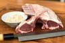 Lamb racks prepared for live grilling